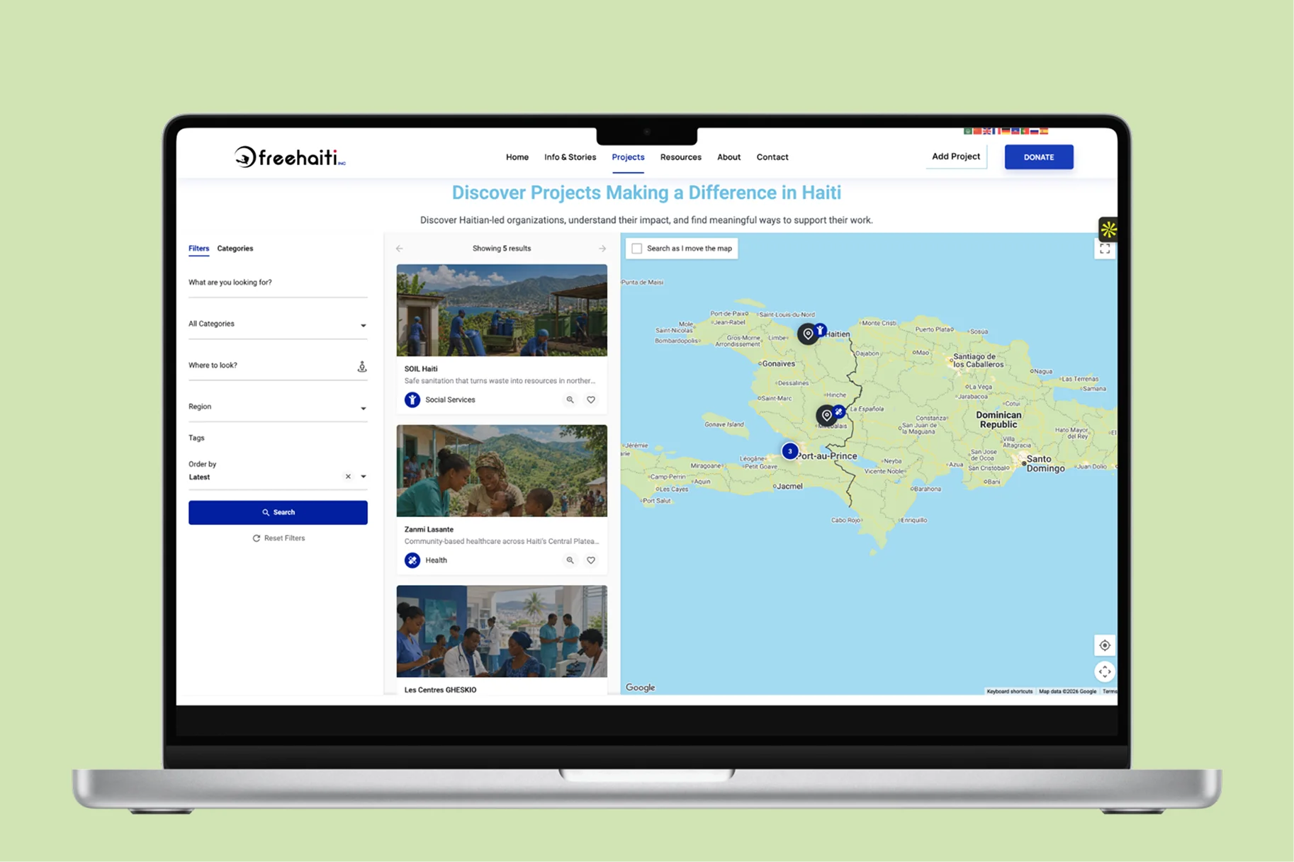 Free Haiti project directory with filters, organization cards and a map of Haiti in a laptop mockup
